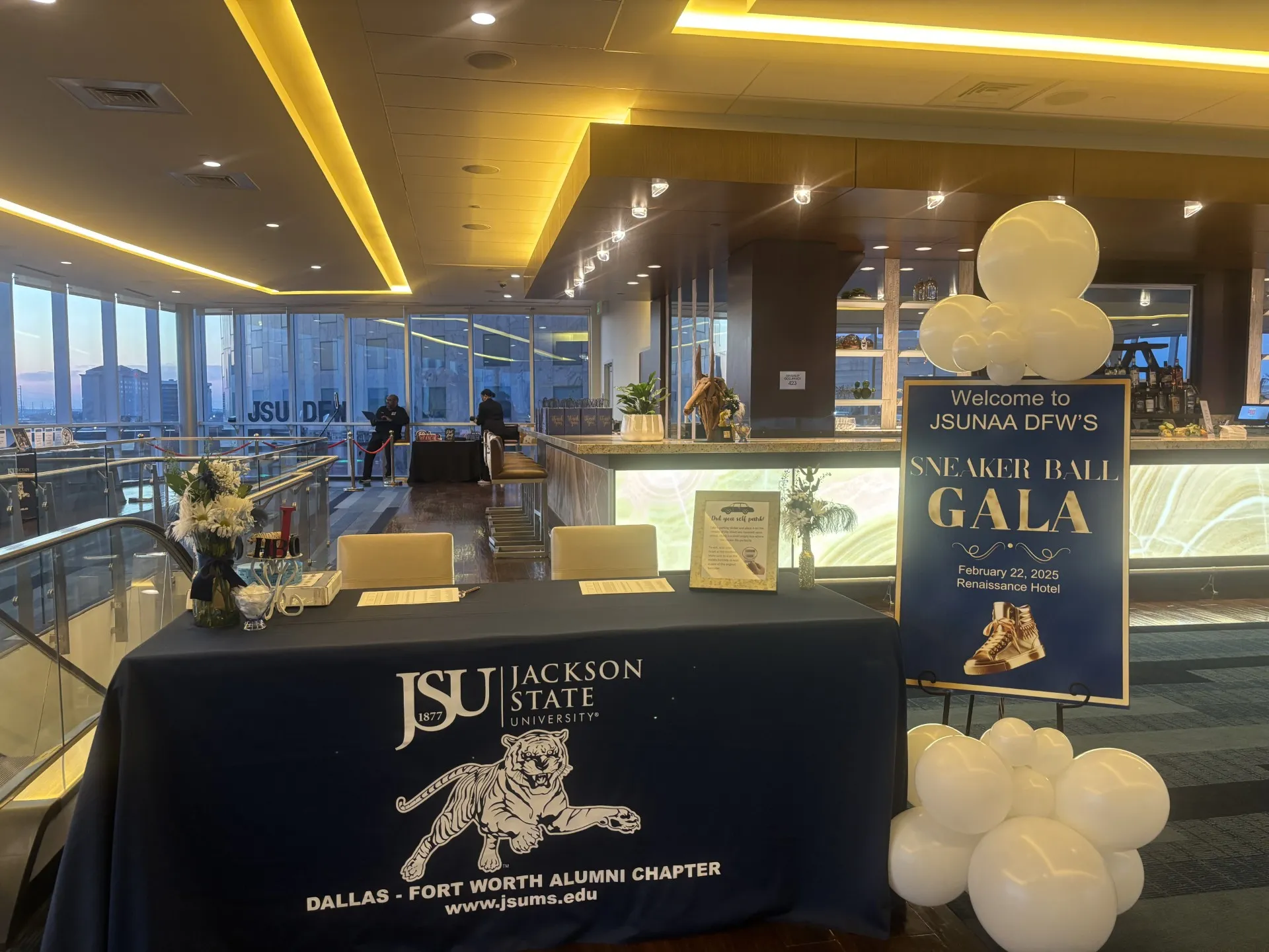 The JSUNAA DFW welcome table and sign at the Sneaker Ball Gala, February 22, 2025